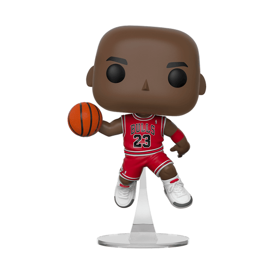 Figurine of a basketball player in a red jersey with the number 23, holding a basketball.